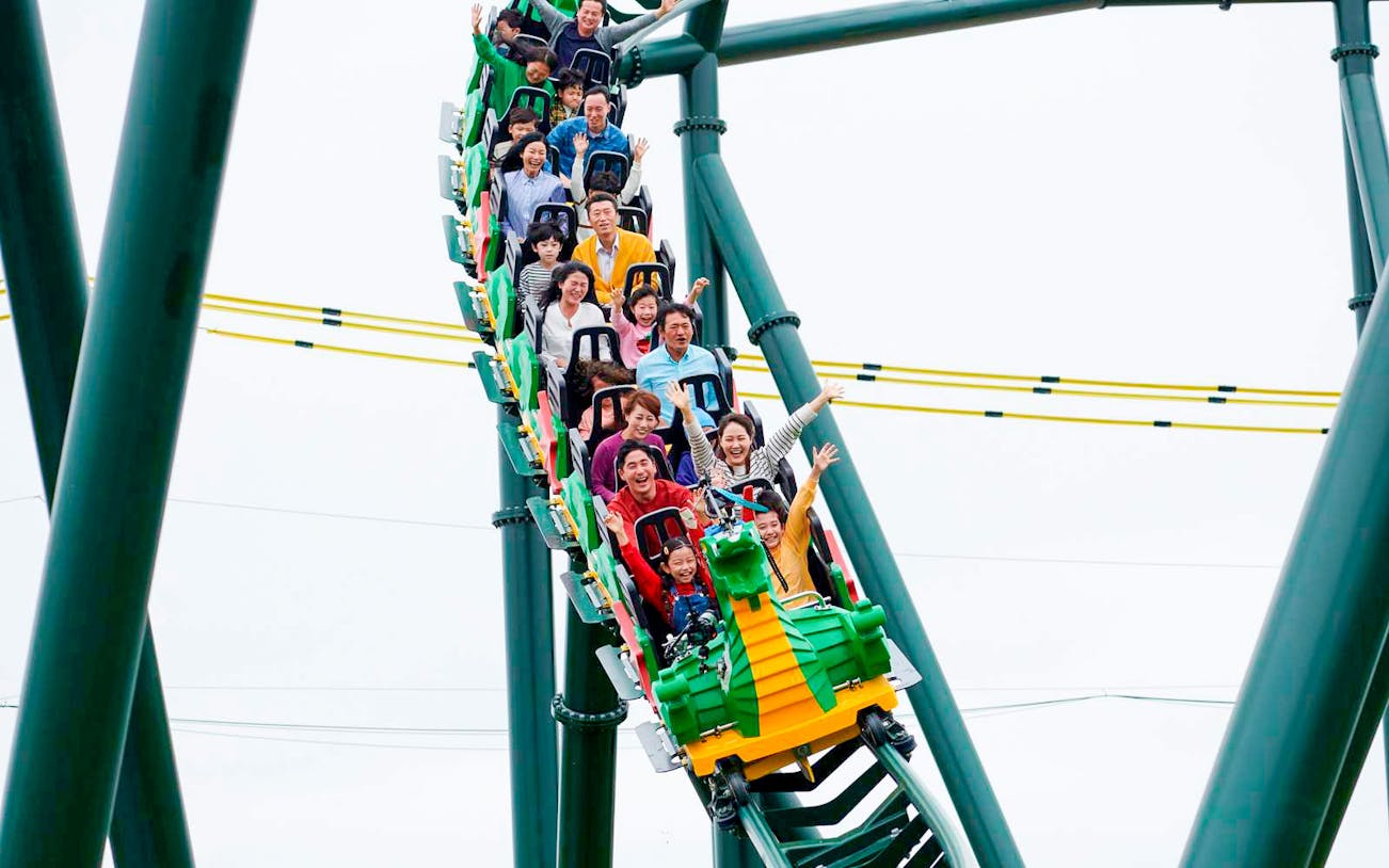 Visitors enjoying a roller coaster ride at LEGOLAND Korea.