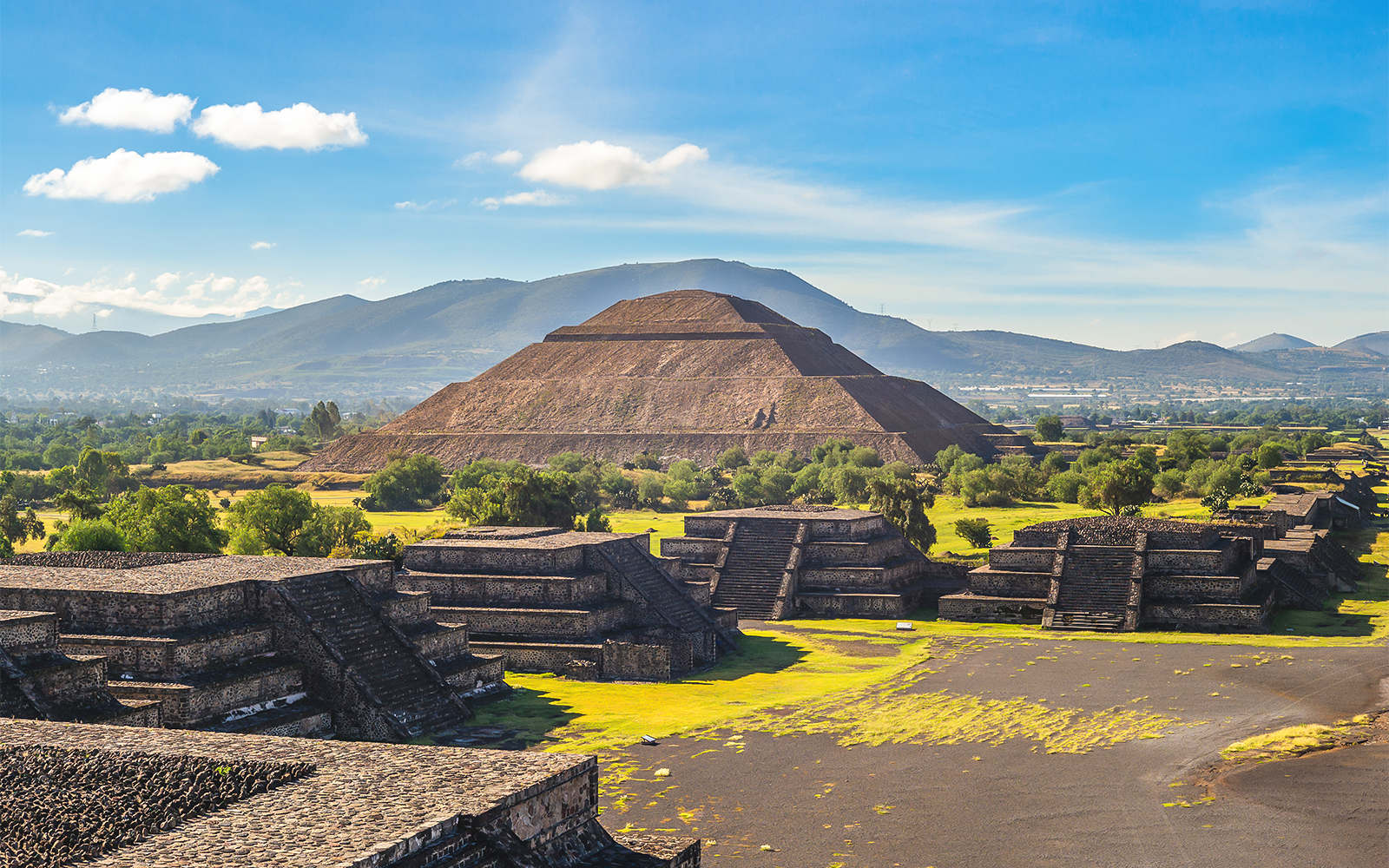 Pyramid of the Sun in Teotihuacan, Mexico, with surrounding ancient structures.