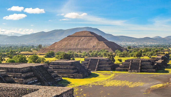Pyramid of the Sun in Teotihuacan, Mexico, with surrounding ancient structures.