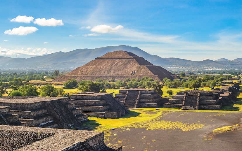 Pyramid of the Sun in Teotihuacan, Mexico, with surrounding ancient structures.