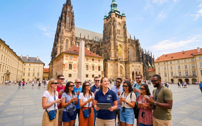 Guests using AR glasses on Prague Castle Time Travel Tour.