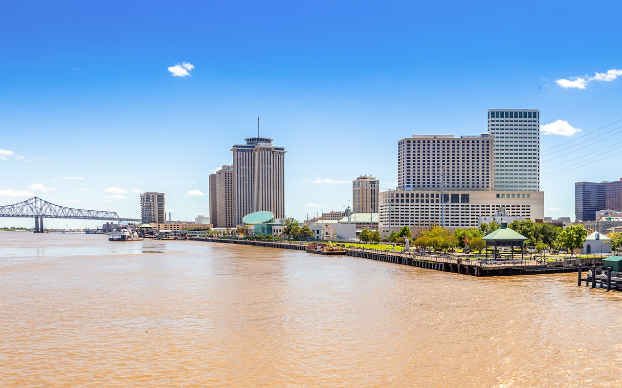 New Orleans skyline with business district skyscrapers viewed from Mississippi River, Louisiana.