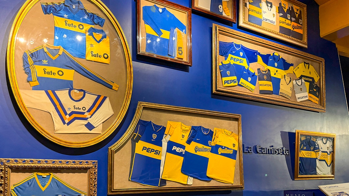 La Bombonera stadium museum interior with River Plate memorabilia display.