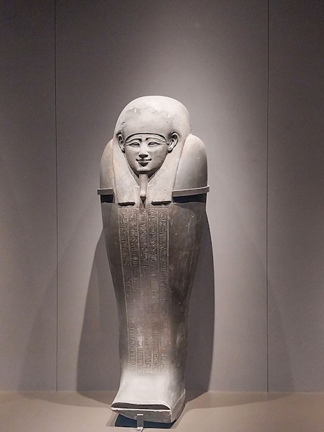 Ancient Egyptian sarcophagi on display at the Grand Egyptian Museum.