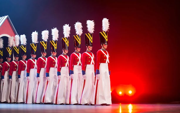 Rockettes performing in toy soldier costumes at Radio City Christmas Spectacular.