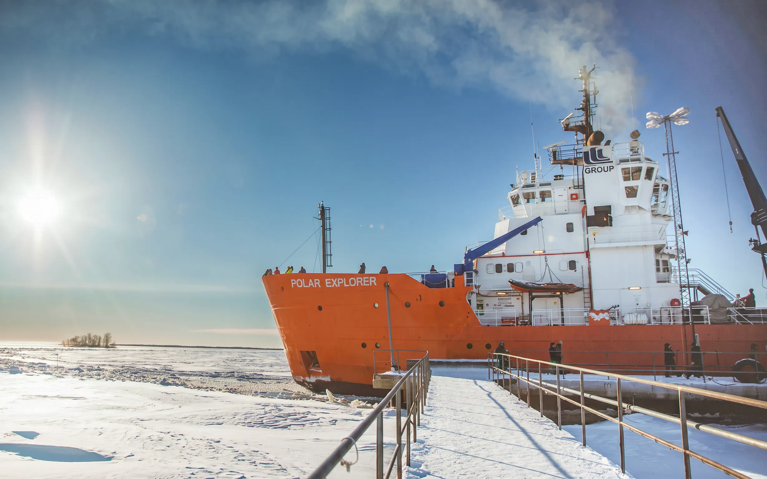 Icebreaker ship Polar Explorer docked on frozen sea in Rovaniemi.