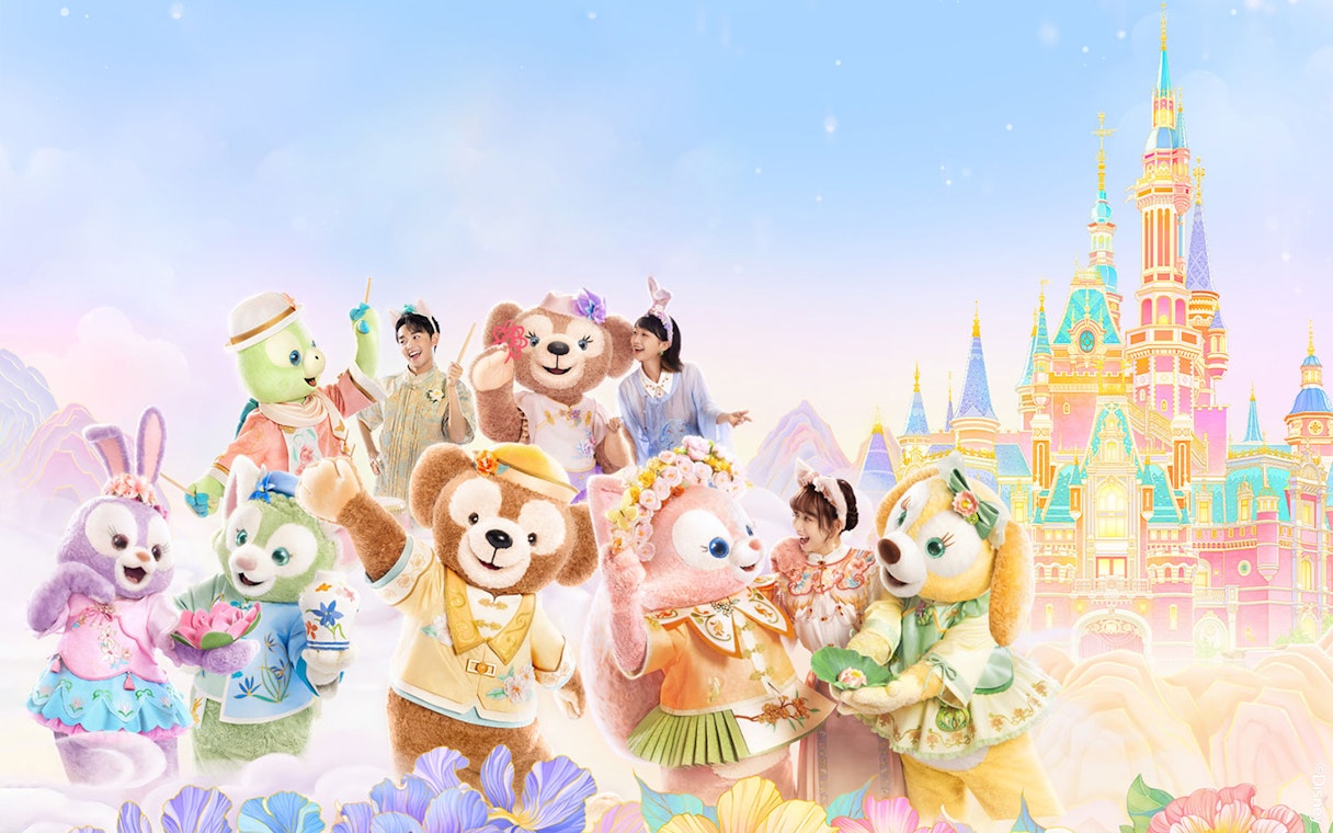 Characters and visitors in front of Enchanted Storybook Castle at Shanghai Disney.