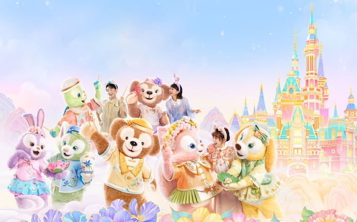 Characters and visitors in front of Enchanted Storybook Castle at Shanghai Disney.