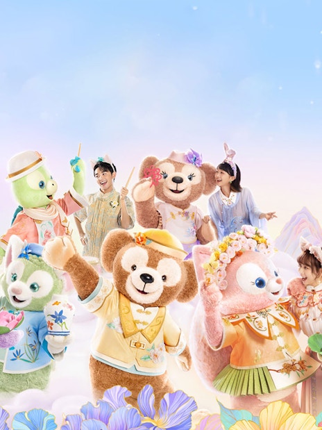 Characters and visitors in front of Enchanted Storybook Castle at Shanghai Disney.