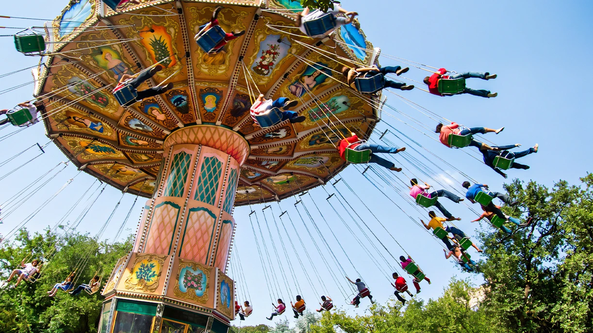 Swing ride at Six Flags Mexico with people enjoying the attraction.