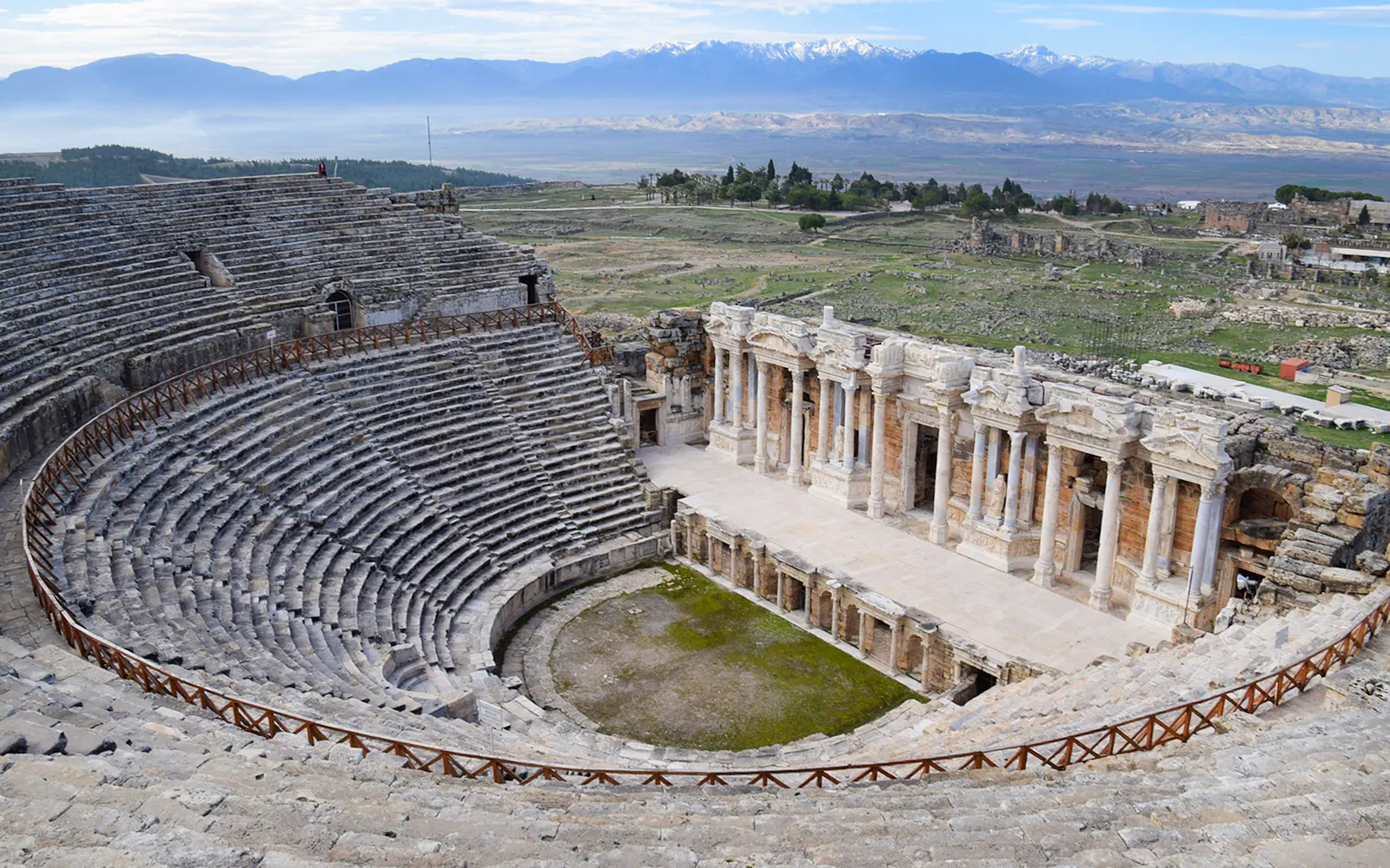 Hierapolis Ancient Theater in Pamukkale with stone seating and stage.