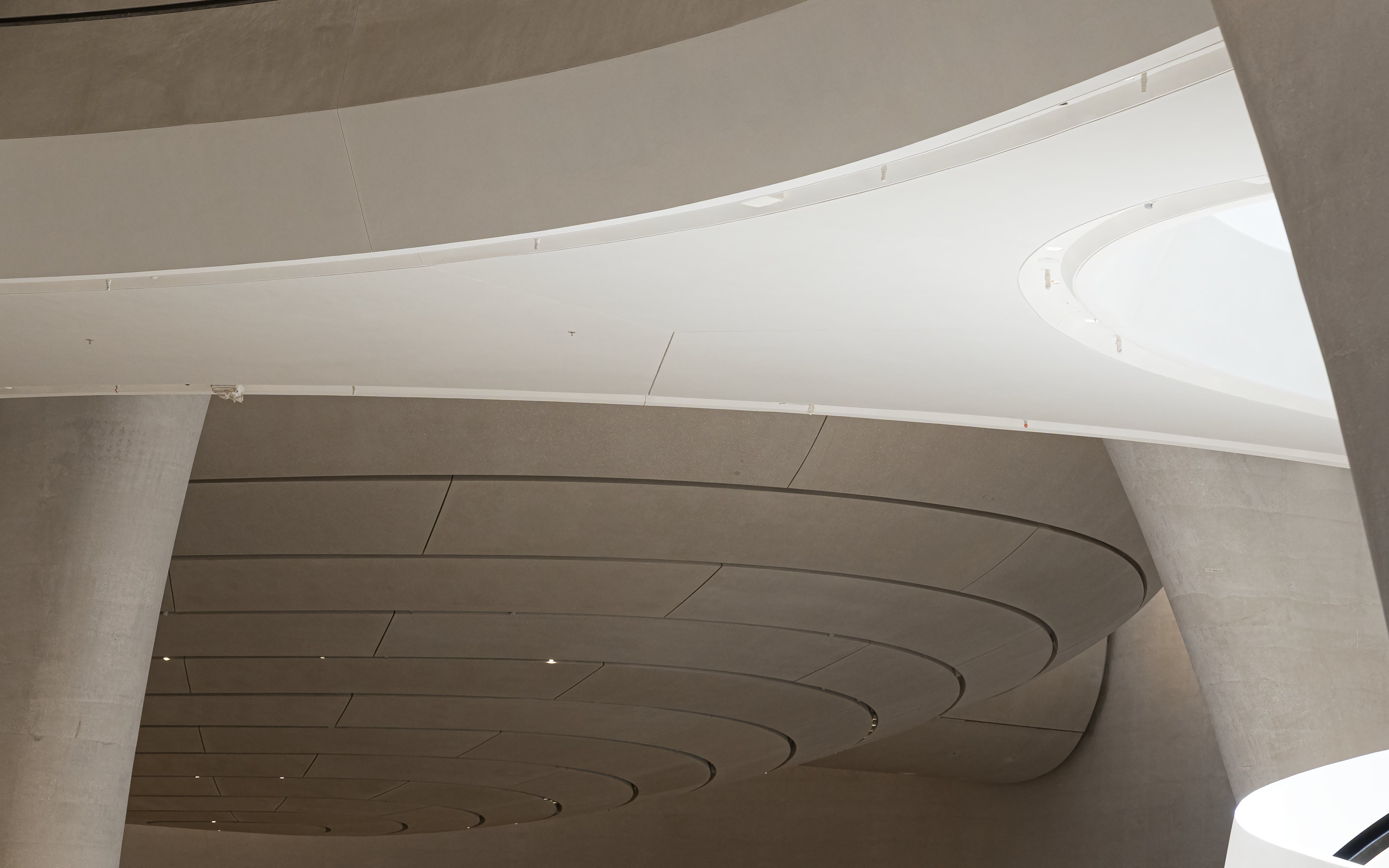 Curved ceiling and architectural details inside Zayed National Museum.