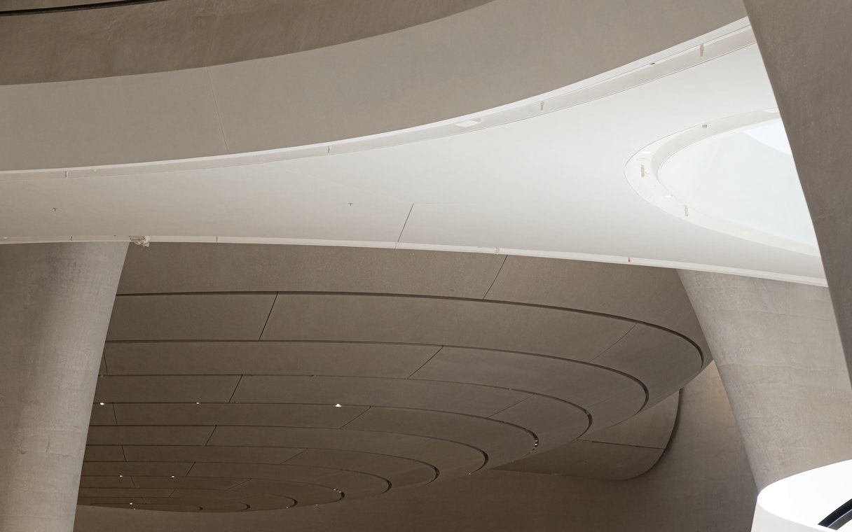 Curved ceiling and architectural details inside Zayed National Museum.