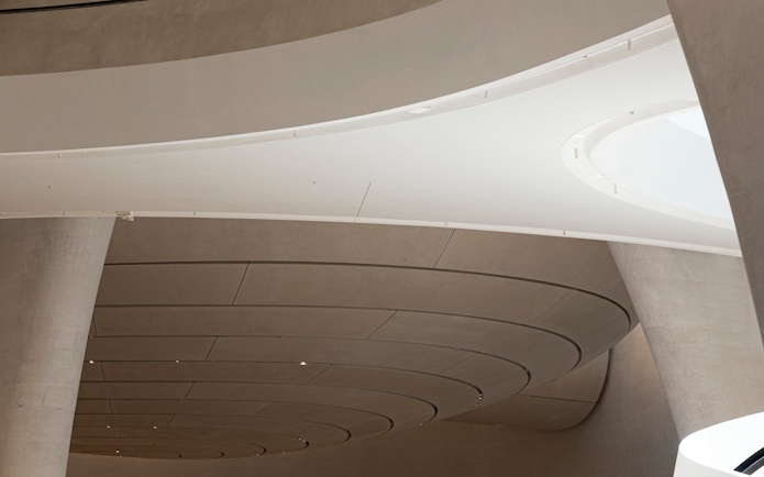 Curved ceiling and architectural details inside Zayed National Museum.