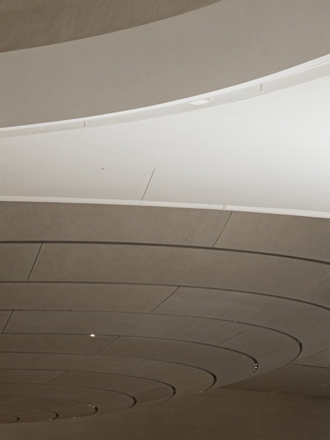 Curved ceiling and architectural details inside Zayed National Museum.