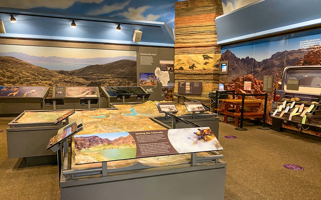 Exhibit showcasing Colorado River and desert landscape at Hoover Dam visitor center.