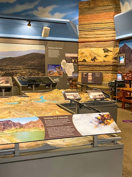 Exhibit showcasing Colorado River and desert landscape at Hoover Dam visitor center.
