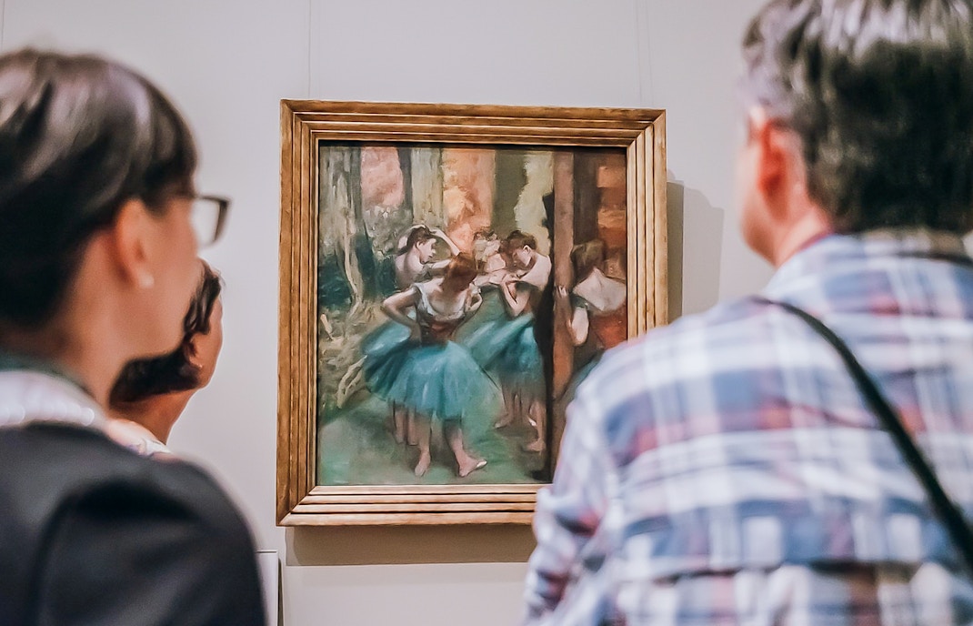 Visitors exploring exhibits at the Metropolitan Museum of Art, New York City.