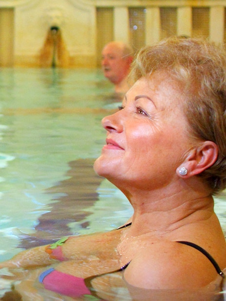 Guests enjoying indoor pools at Lukacs Spa.