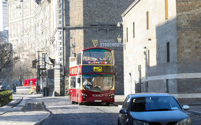 Hop on hop off bus near Guinness Storehouse in Dublin.