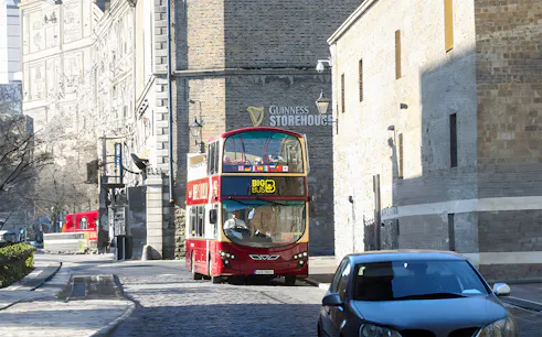 Hop on hop off bus near Guinness Storehouse in Dublin.