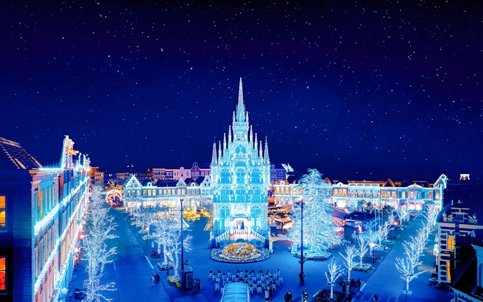 Huis Ten Bosch illuminated at night with festive lights, Nagasaki, Japan.