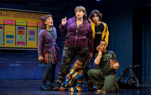 Group of actors performing a scene from the musical "Kimberly Akimbo" on stage.