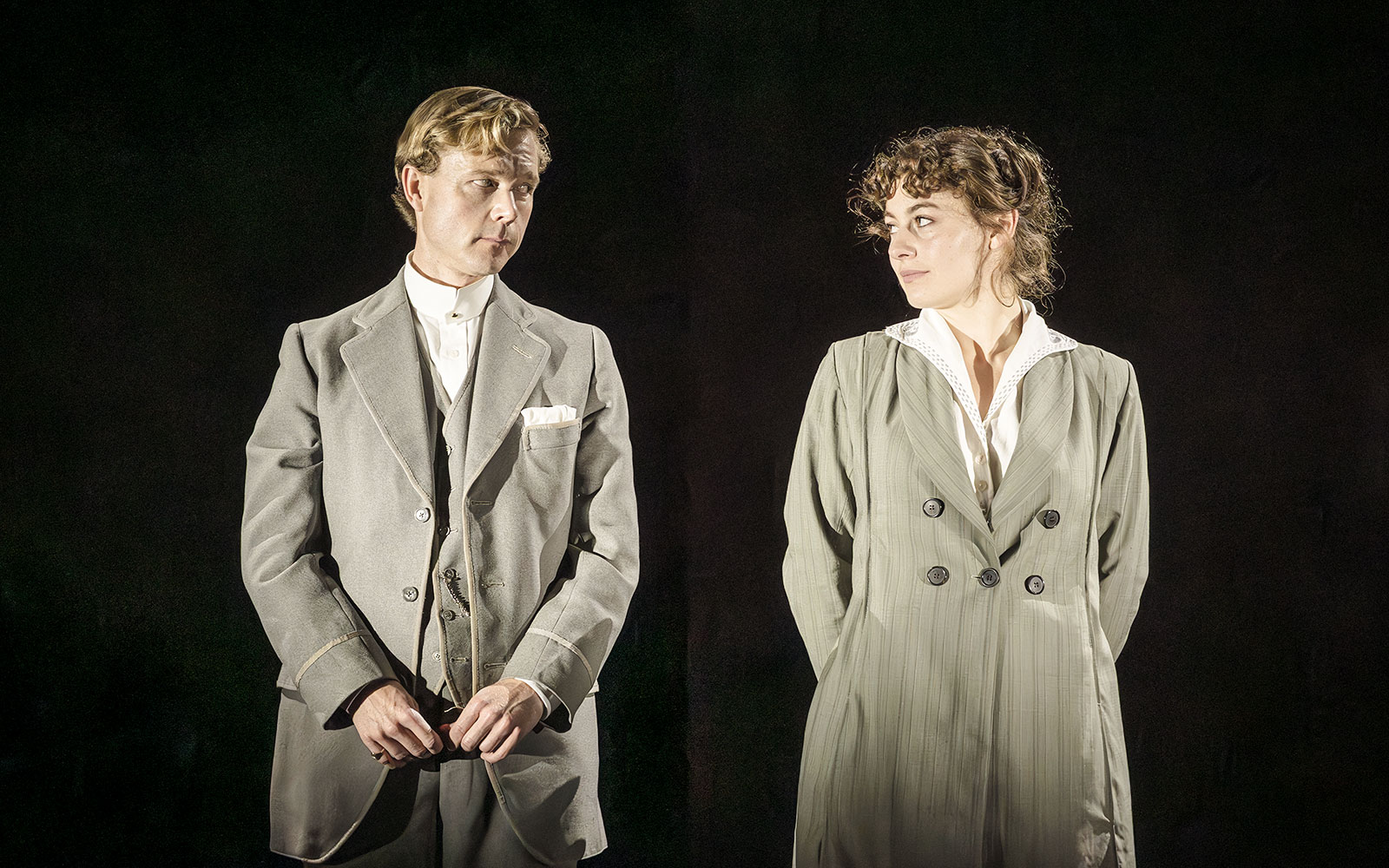 Performers in period costumes on stage in Grace Pervades West End show.