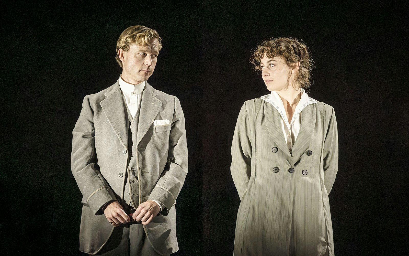 Performers in period costumes on stage in Grace Pervades West End show.