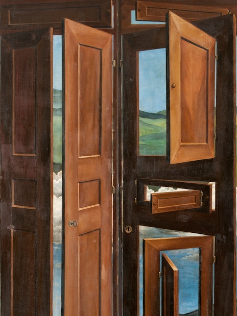 Surrealist wardrobe with open doors revealing landscapes by Marcel Jean at MAPFRE, Madrid.