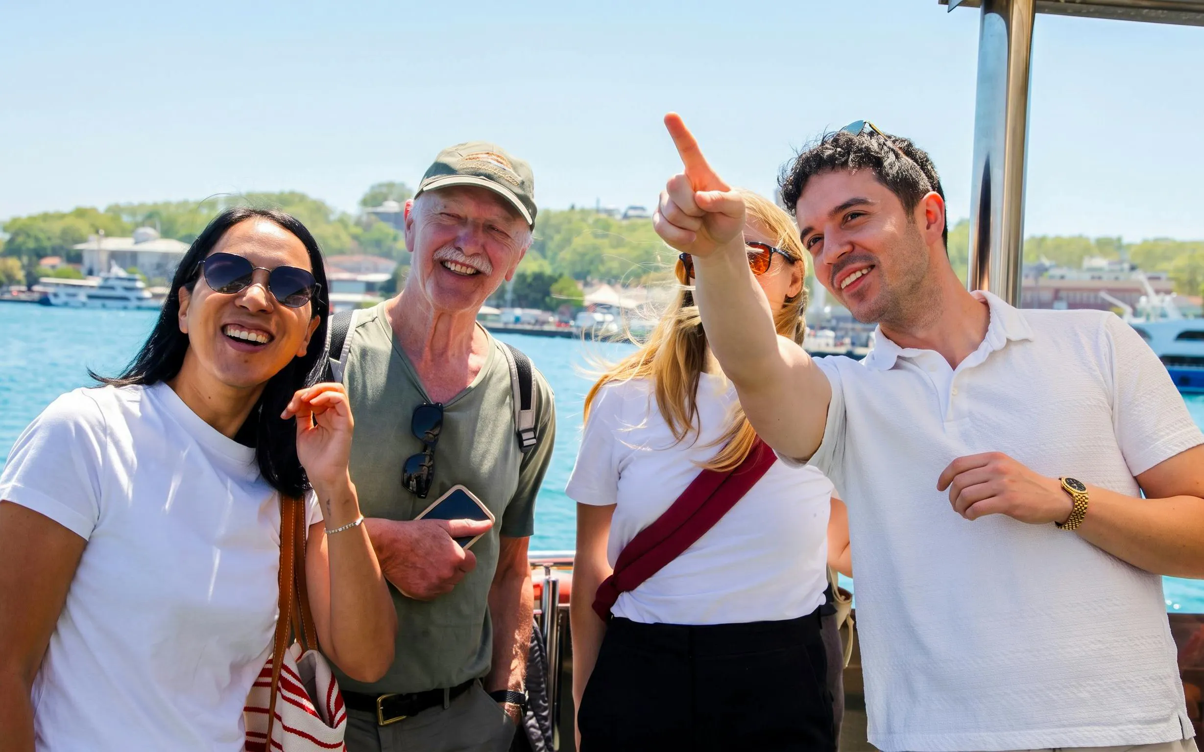 Tourists enjoying a guided Istanbul food tour by the Bosphorus.