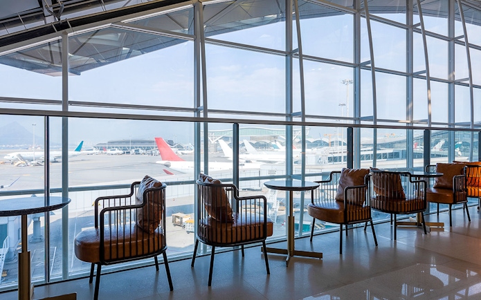 Seating area with airport view at Plaza Premium Lounge.