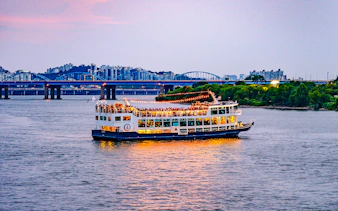 Sunset cruise on Eland Cruise ship with cityscape view, Seoul.