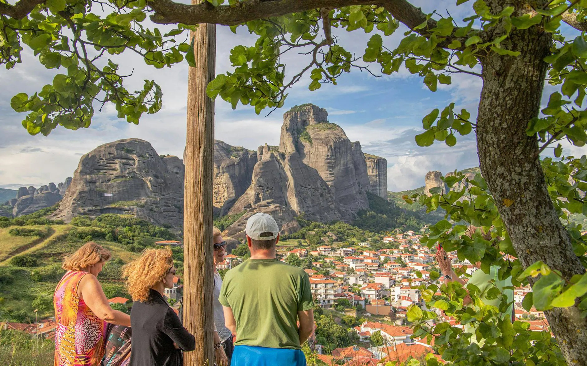 Tourists viewing Meteora rock formations near Athens, Greece.