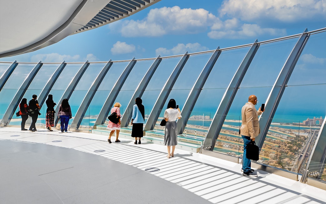 Visitors enjoying the panoramic view from View at The Palm, Dubai.