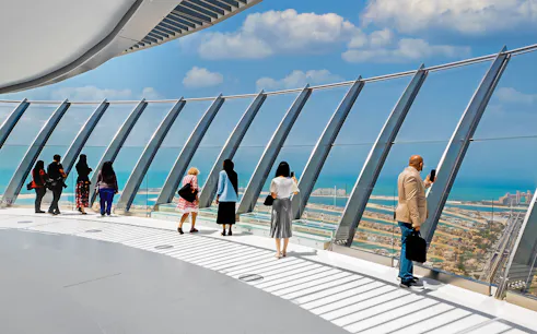 Visitors enjoying the panoramic view from View at The Palm, Dubai.