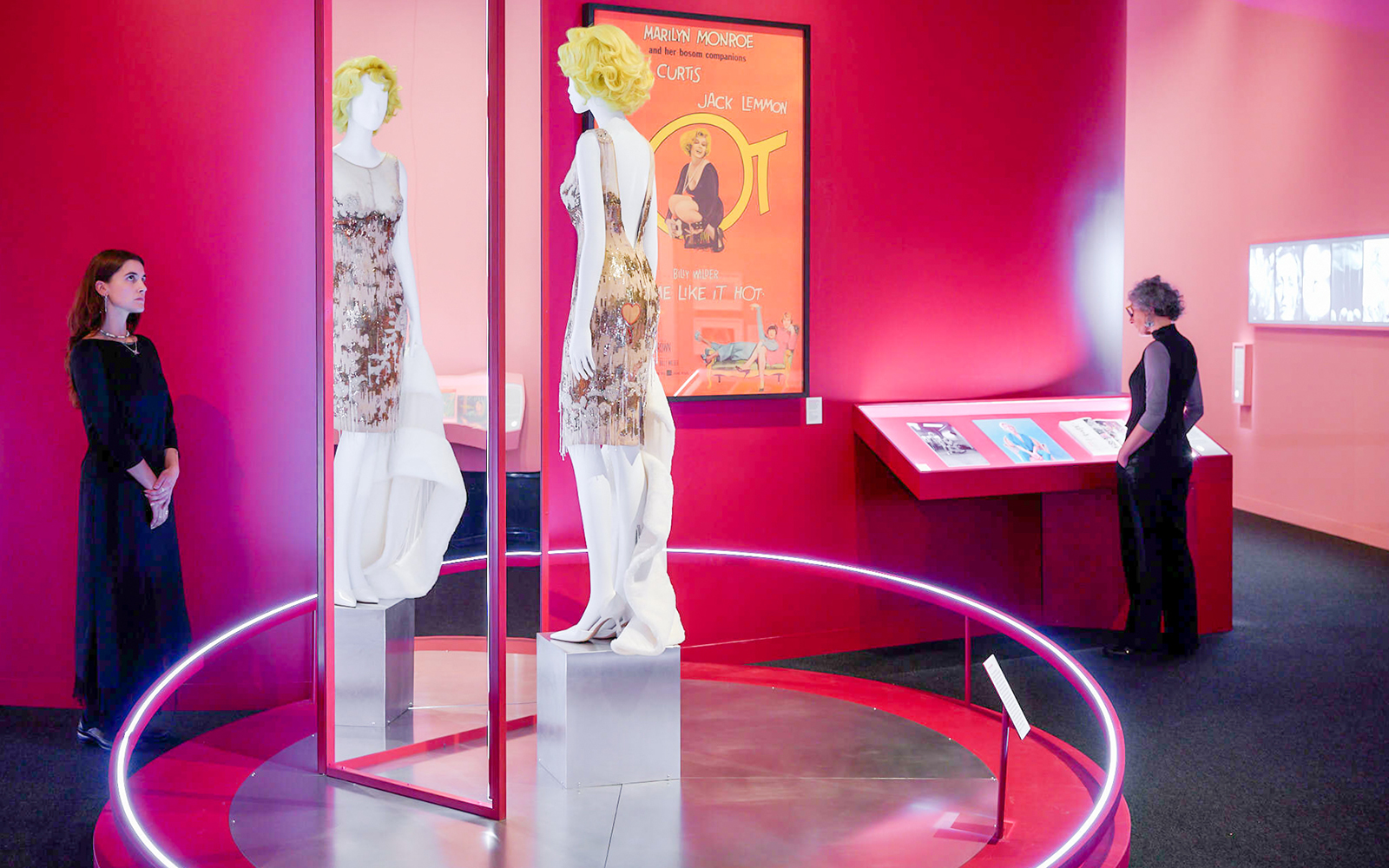Mannequins in sequined dresses at Art Science Museum's Future World exhibit.