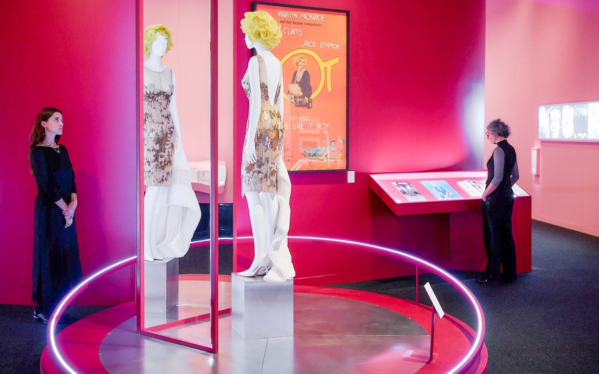 Mannequins in sequined dresses at Art Science Museum's Future World exhibit.