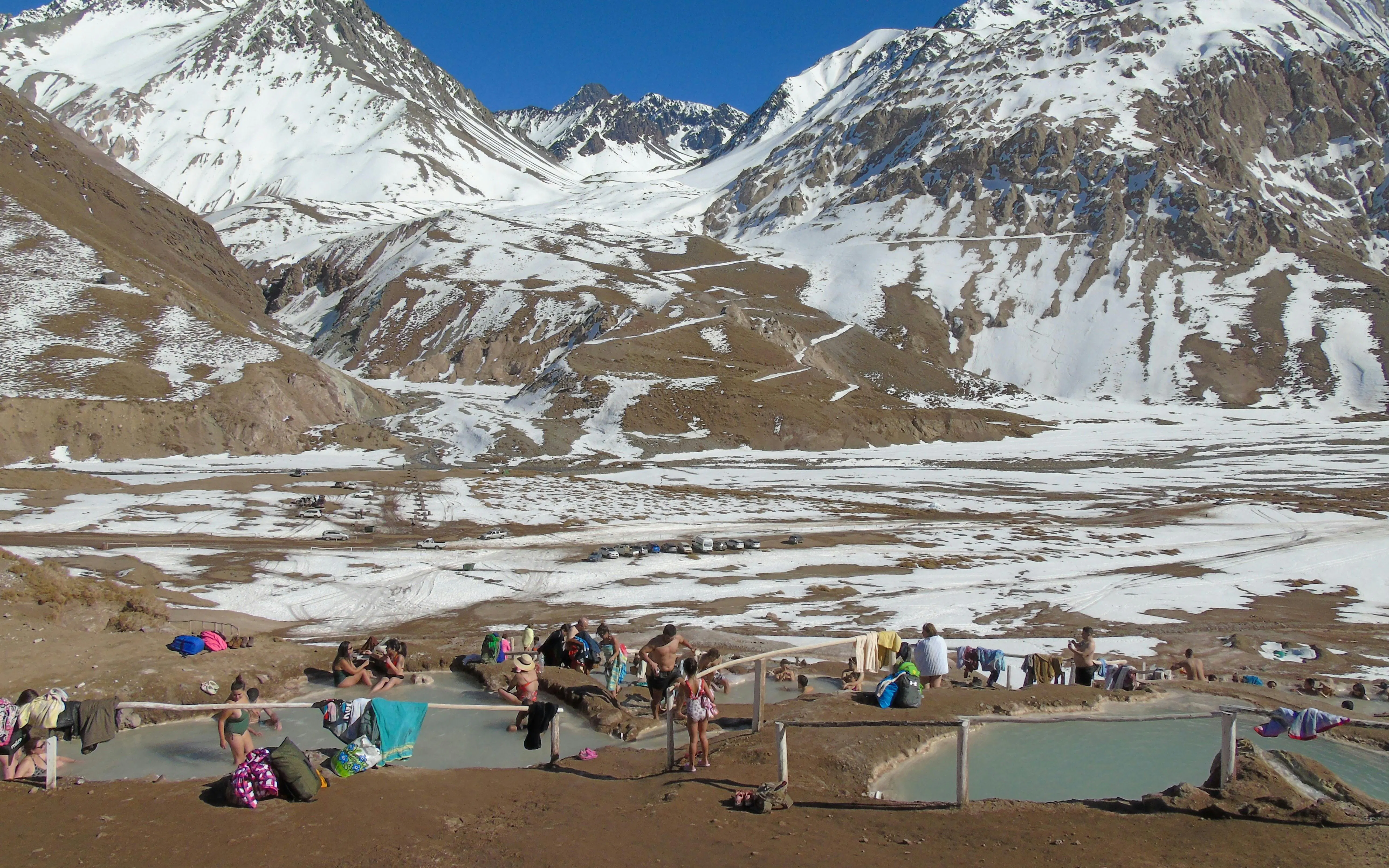 Visitors enjoying hot springs at Valle Colina, Cajon del Maipo, Andes, Santiago, Chile.