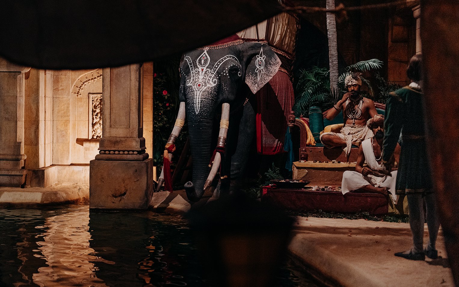 Elephant statue and performers at World of Discoveries Interactive Digital Exhibition.