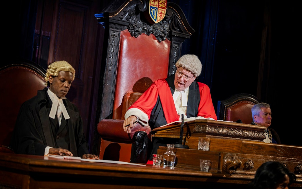 Stage scene from "Witness for the Prosecution" in West End courtroom setting.