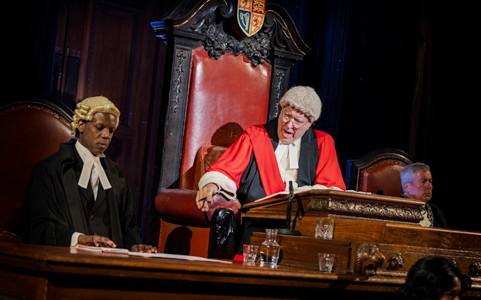 Stage scene from "Witness for the Prosecution" in West End courtroom setting.