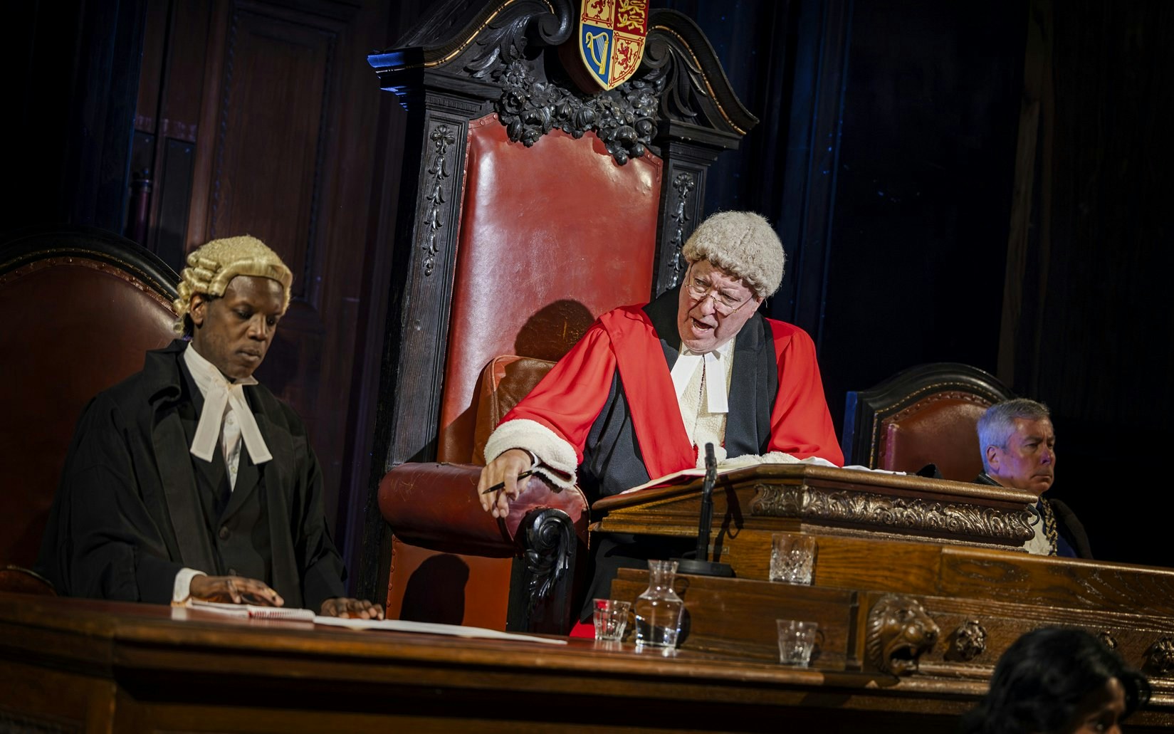Stage scene from "Witness for the Prosecution" in West End courtroom setting.