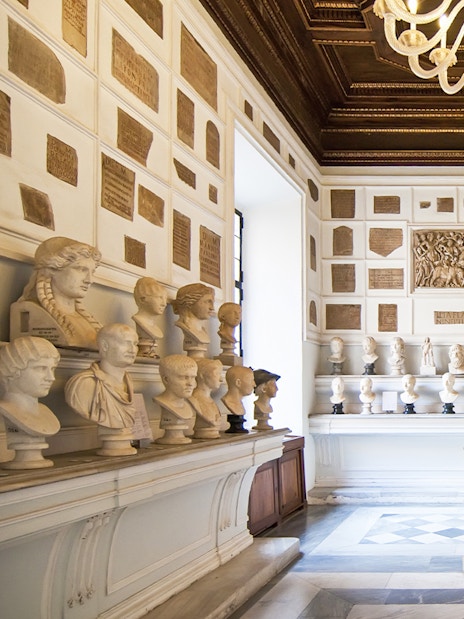 Busts and sculptures in a gallery at Musei Capitolini, Rome.