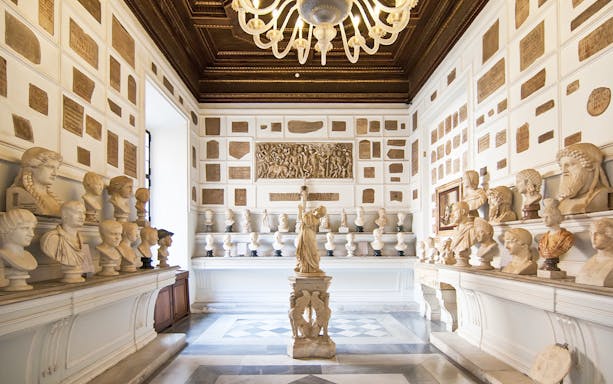 Busts and sculptures in a gallery at Musei Capitolini, Rome.