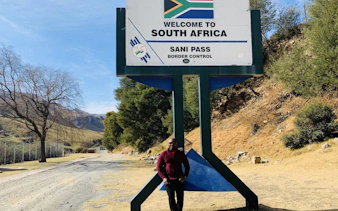 Welcome sign at Sani Pass border control, South Africa, on Mountain Splendor tour from Durban.