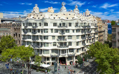 La Pedrera-Casa Milà in Barcelona, view of the unique facade and rooftop sculptures.