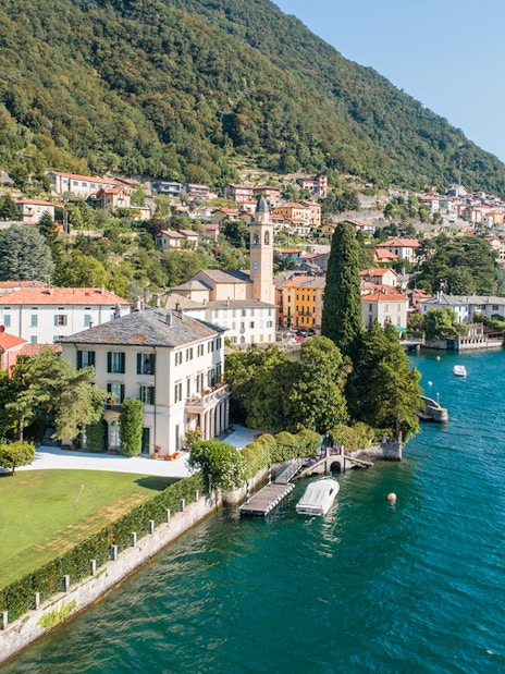 George Clooney's residence on Lake Como, Italy, with scenic waterfront and hillside village.