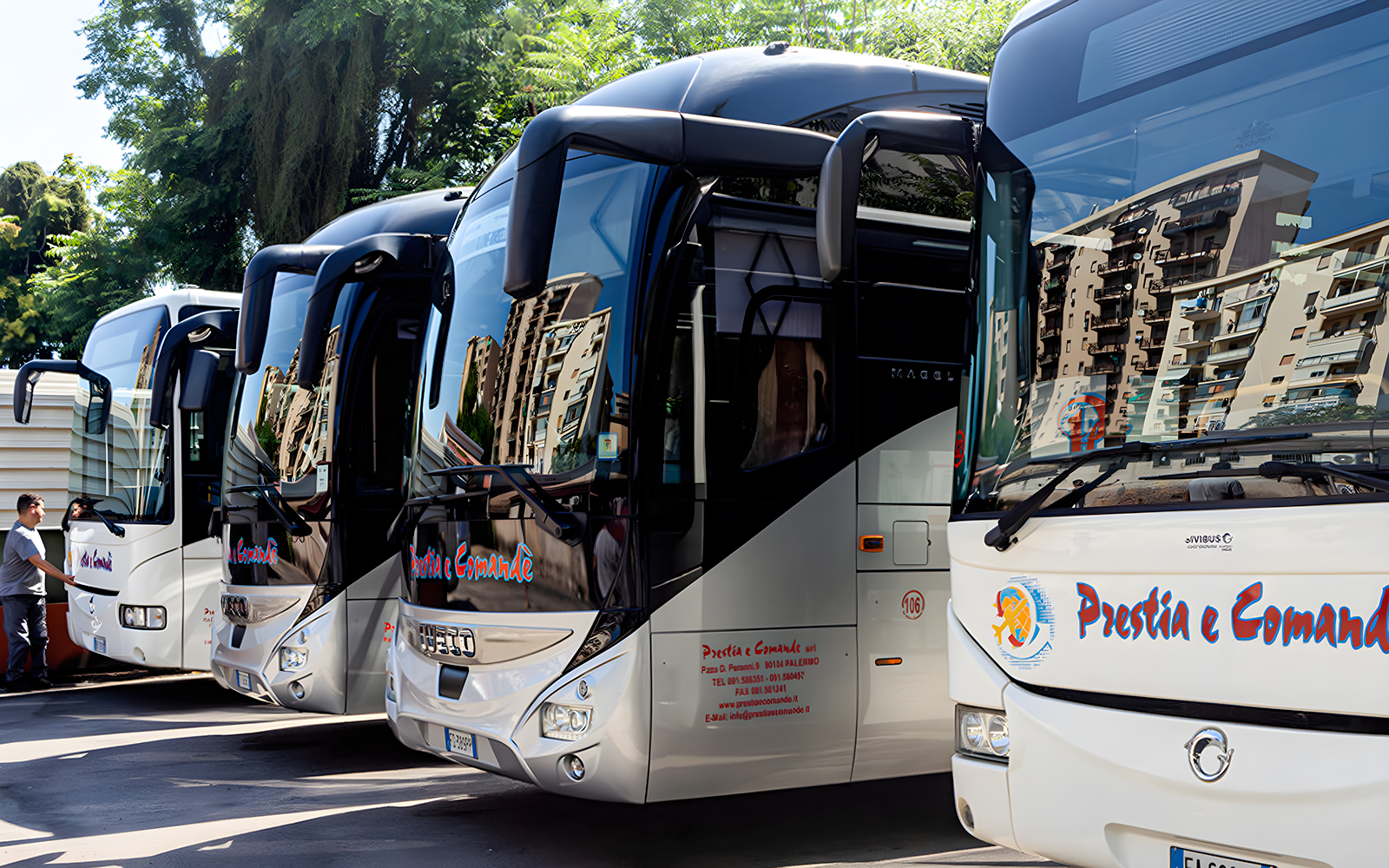 Prestia and Comandè buses parked in Palermo lot.