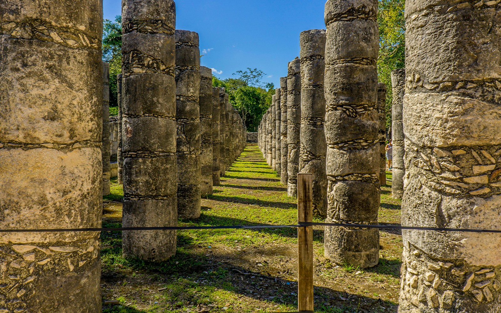 Row of stone columns at Chichen Itza ruins in Yucatan, Mexico.